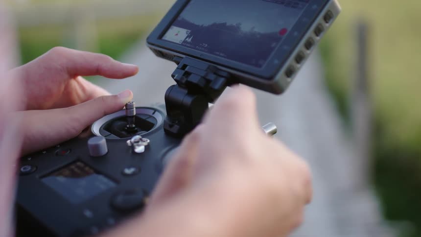A person is controlling a drone