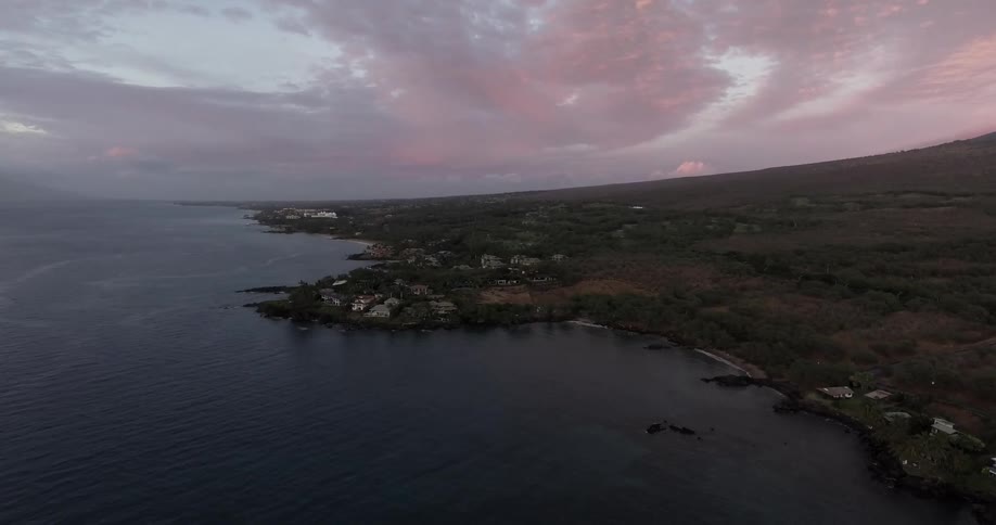 Aerial view of a coastal area at sunset
