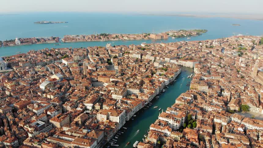 The river runs towards the ocean past the city