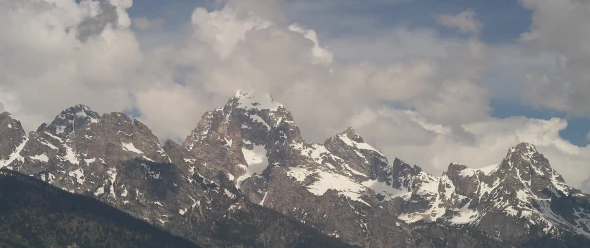 Snow covered mountains on a cloudy day