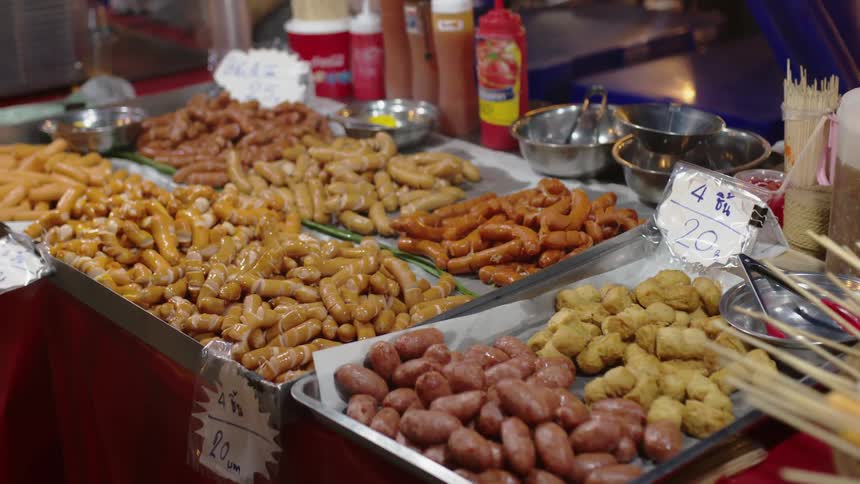Food is displayed for sale at a street market