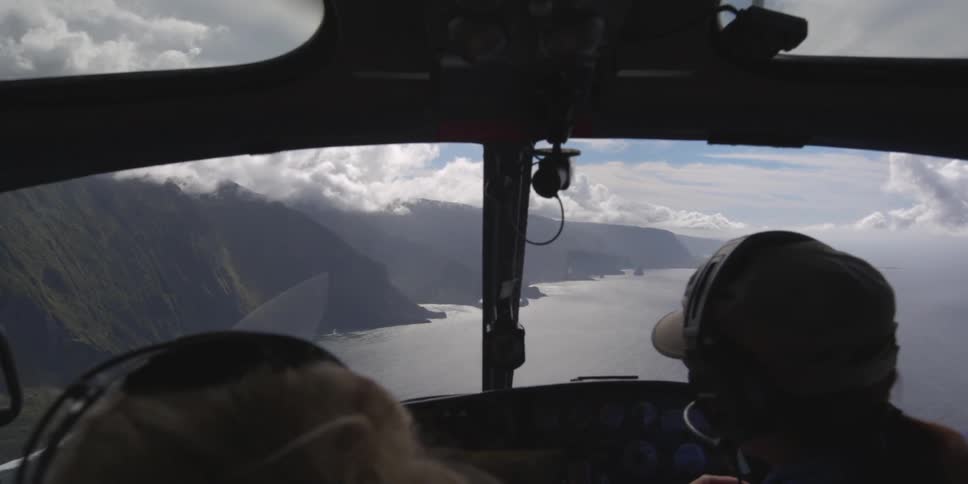 People are flying in a helicopter
