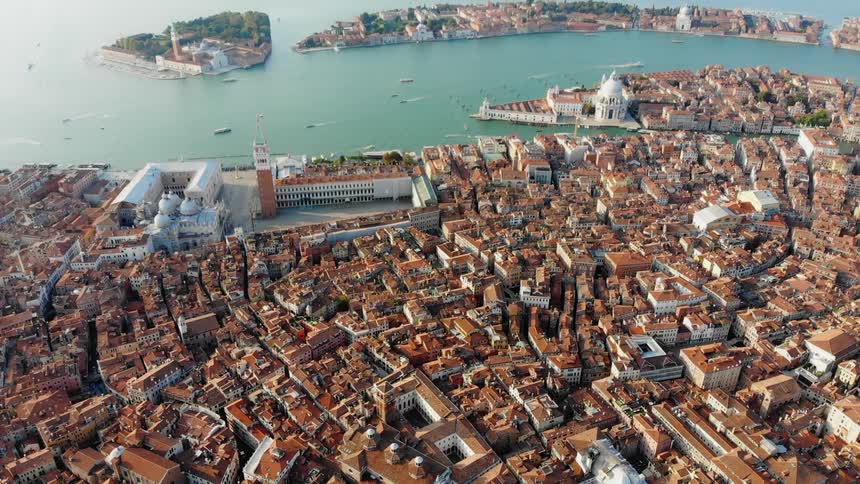 City buildings sit on a coastline
