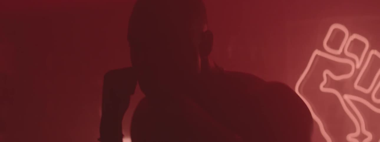 Man boxes in a smoky room