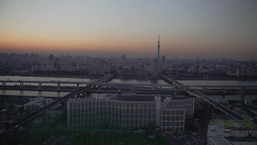 The sun is nearly set over the city