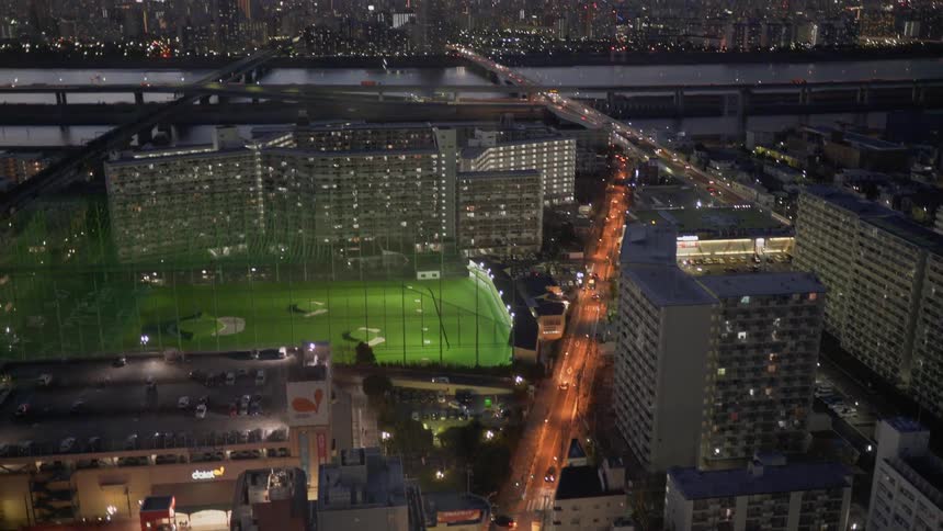 A sports complex in Tokyo is seen at night