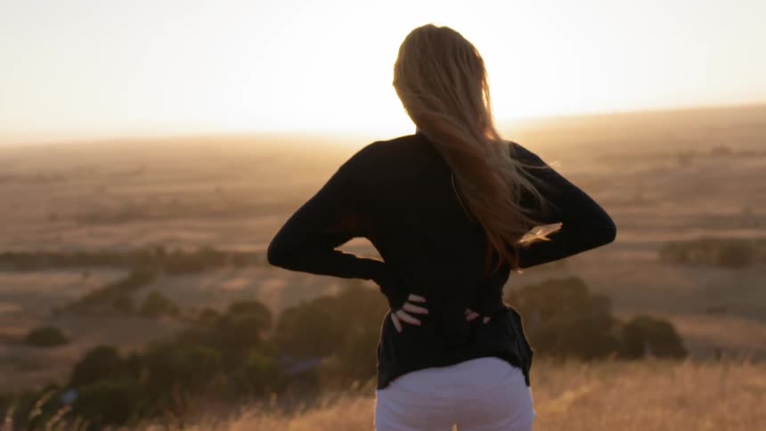 Woman In Nature And Watching Sunset