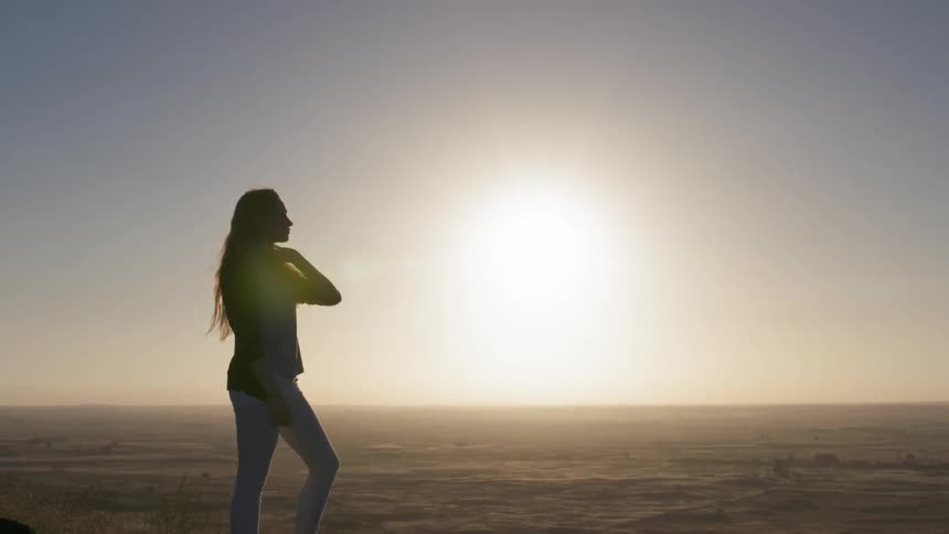 Woman In Nature And Watching Sunset