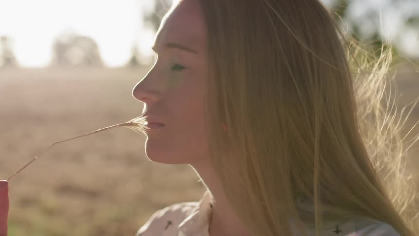 A woman's hair blows in the breeze