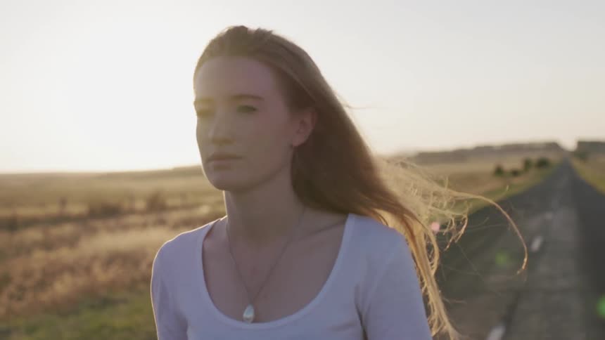 Woman In Nature And Watching Sunset