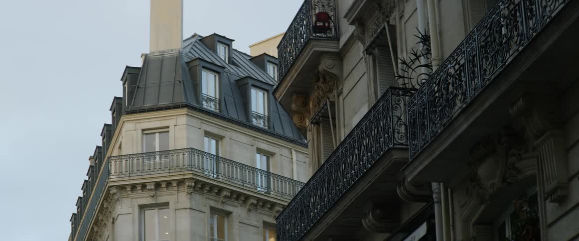 The balcony on the building is empty