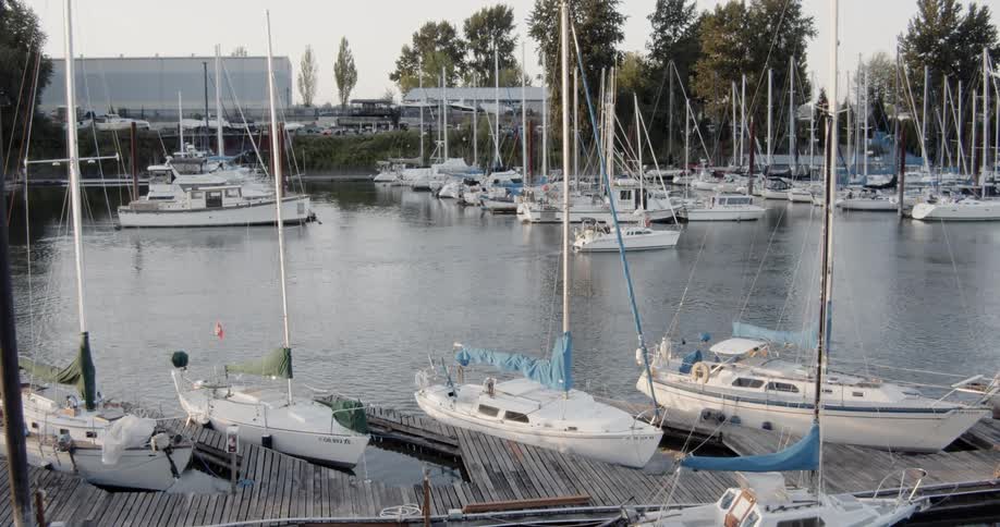 A small boat leaves the docks