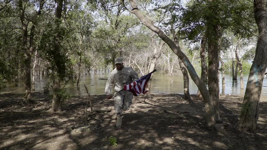 Army man is running with american flag