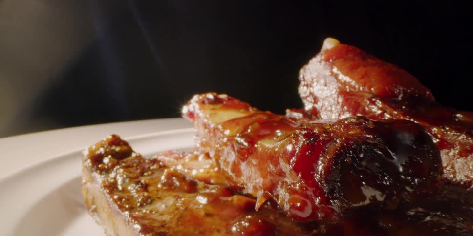 Pile of sauced meat on a plate
