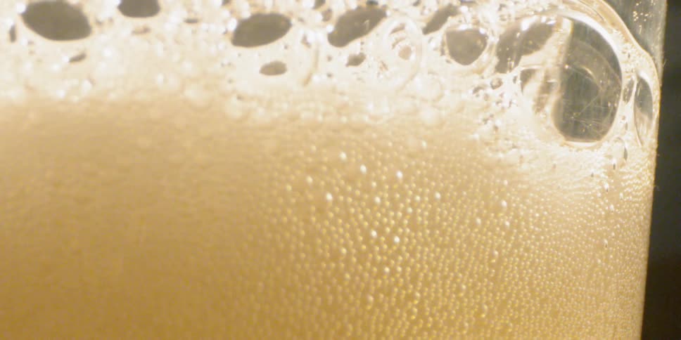 The beverage has many bubbles on top