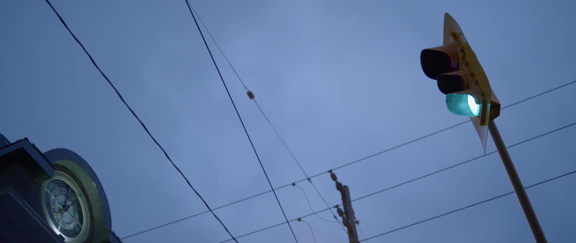 Telephone wires crisscrossing