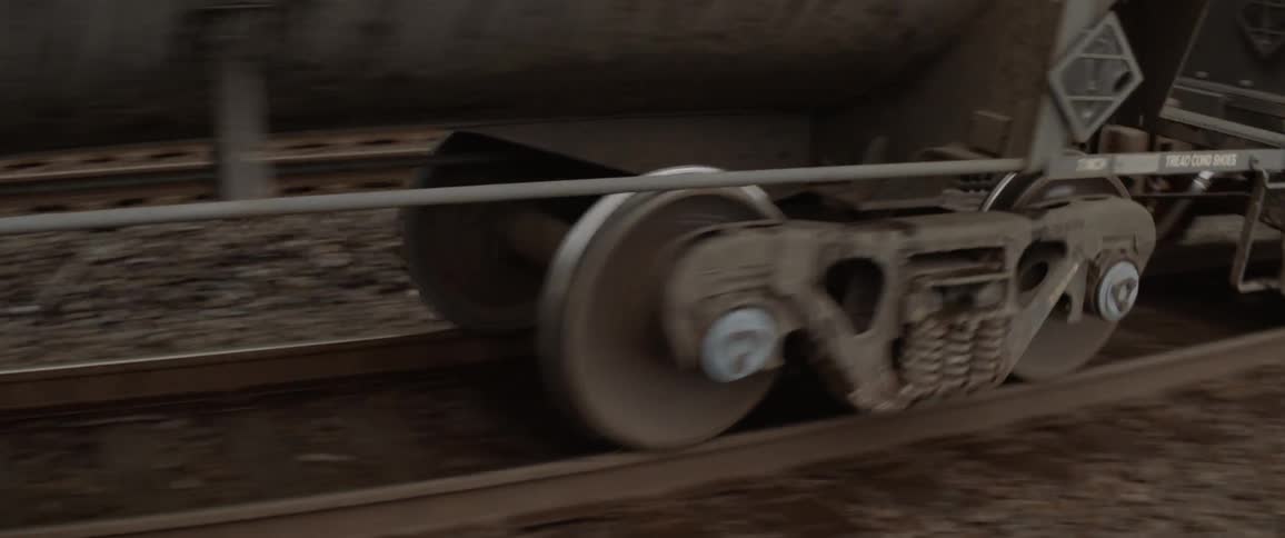 Train travels along tracks