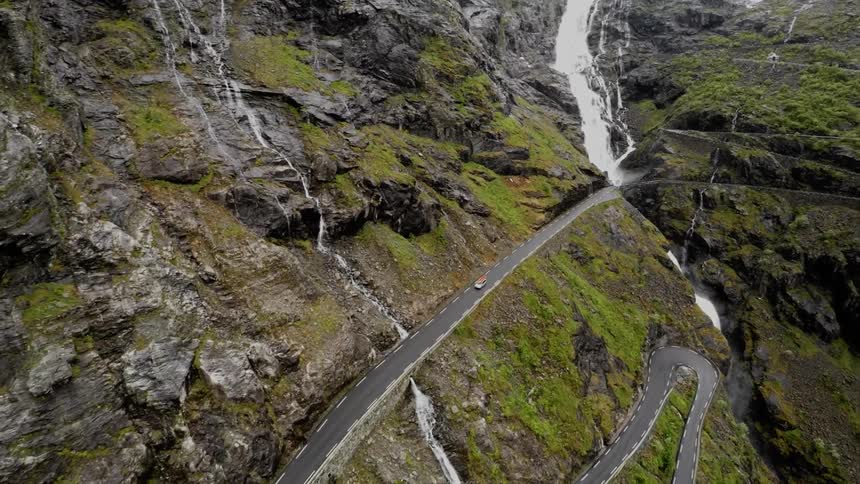 A car travels on a mountain road