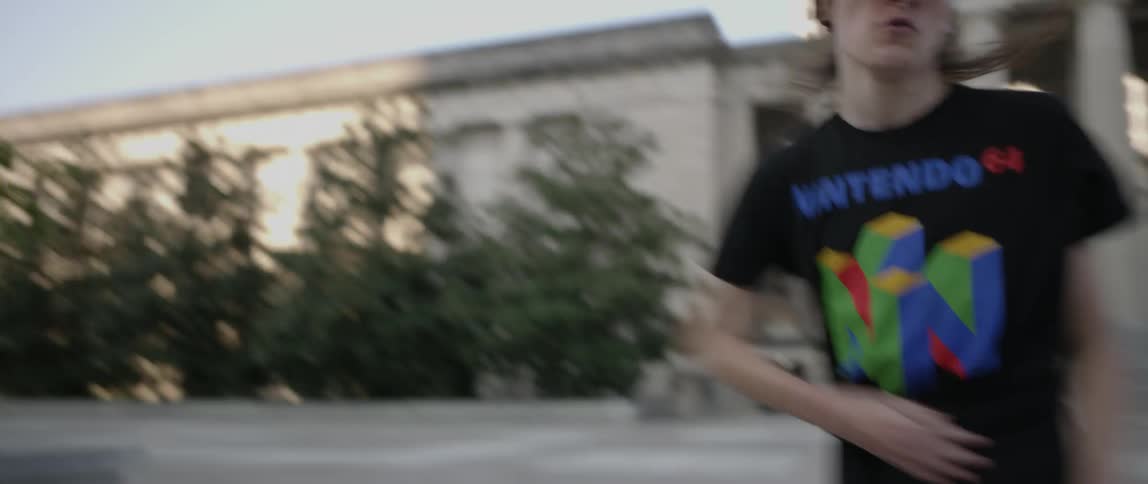 Man dances in an empty city square
