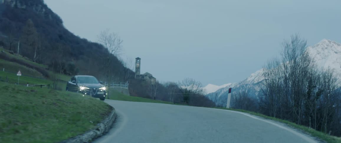 A vehicle slowly drives around the road