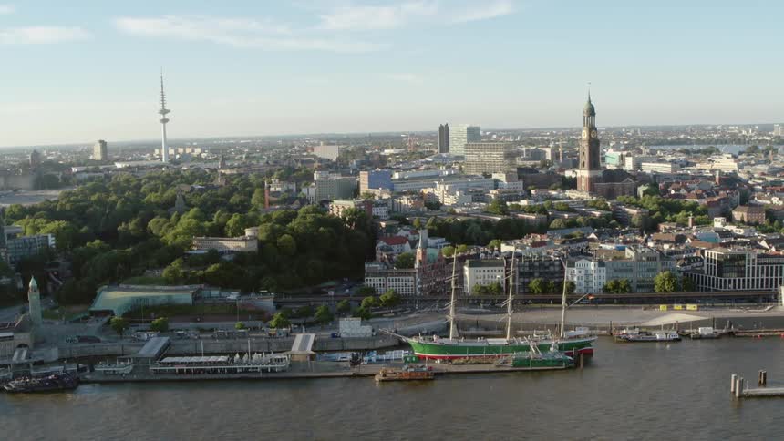 Hamburg Harbor - The boats are docked by the city