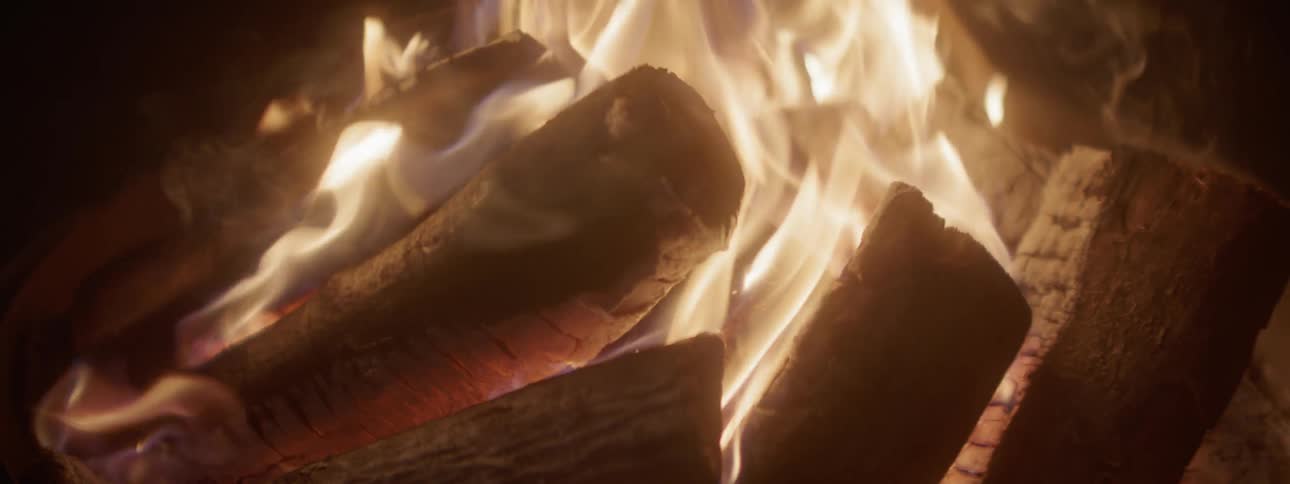 Logs burn hot in a fire