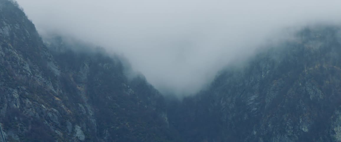 View of mountains through the clouds