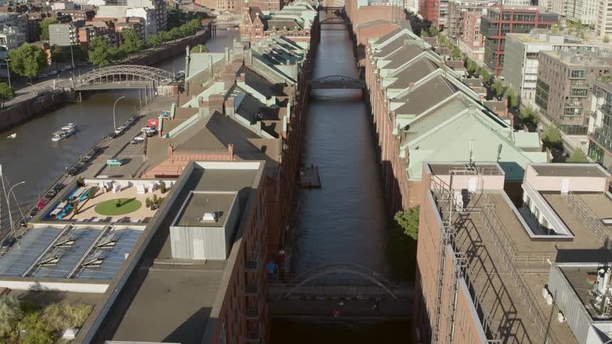 Hamburg Speicherstadt - Canal flows in between two rows of houses