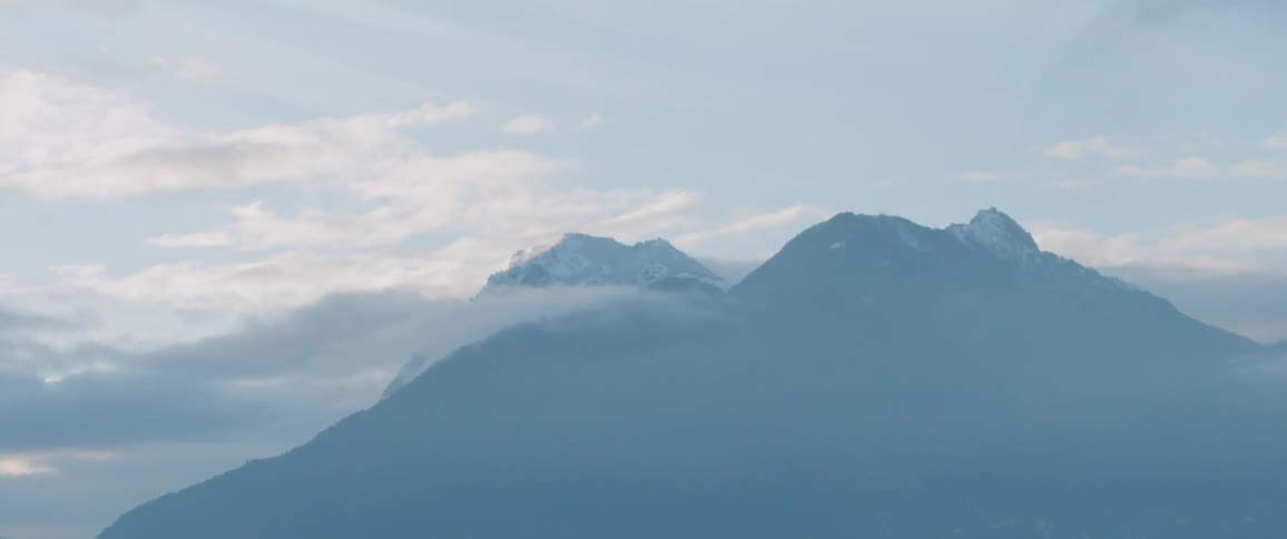 View of mountains through the clouds