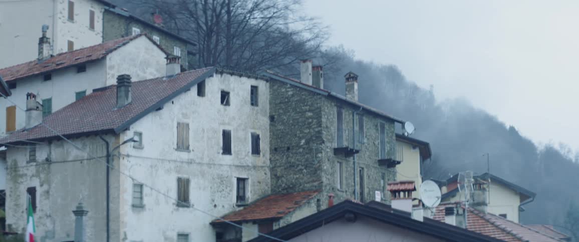 Small town in the foggy mountains