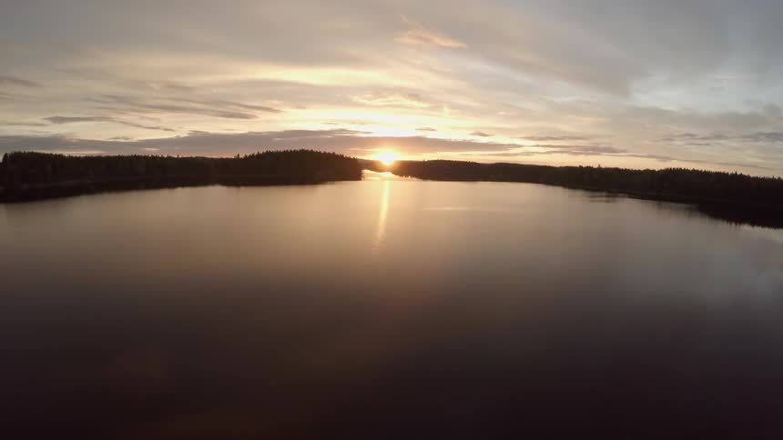 A body of water at dawn