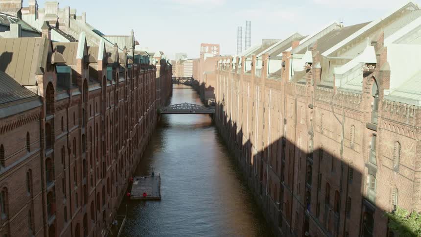 Hamburg Speicherstadt Canal between rows of apartment buildings