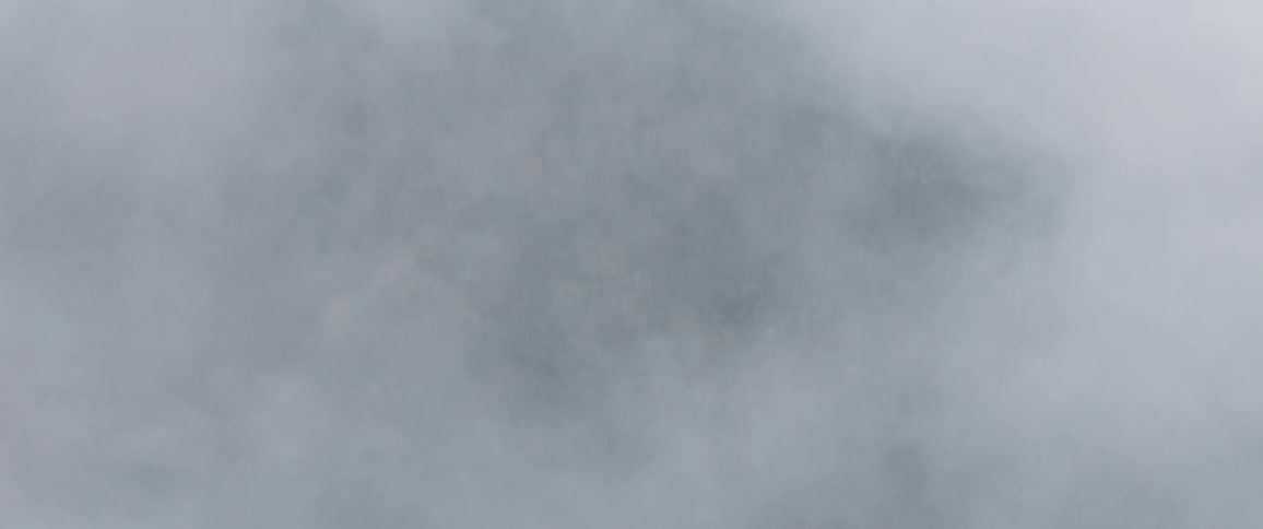 Clouds hover above the ground