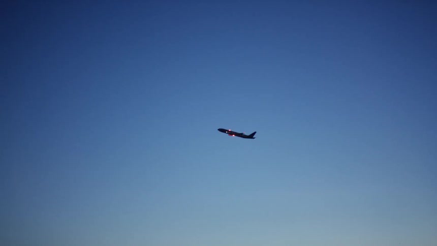 An airplane flying in the sky
