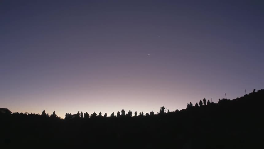 People standing on the horizon