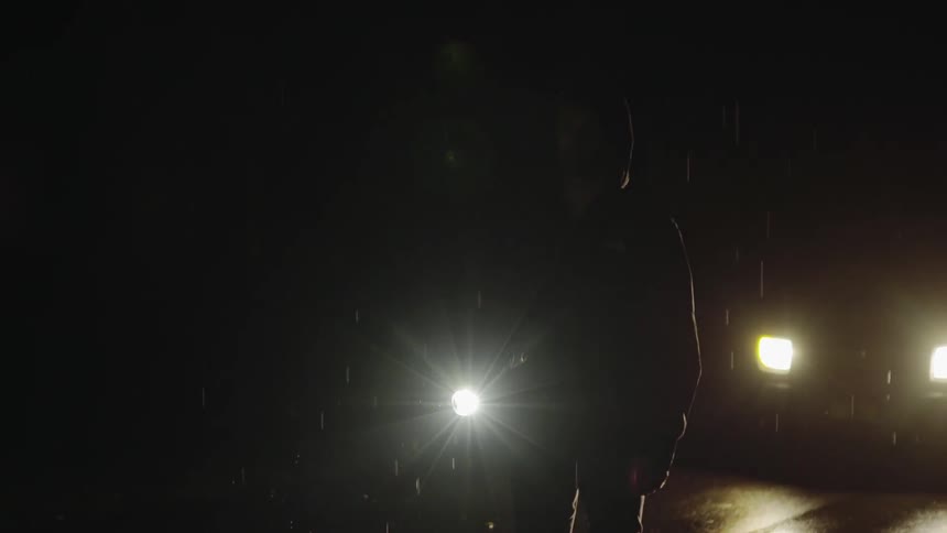 Person standing in the rain
