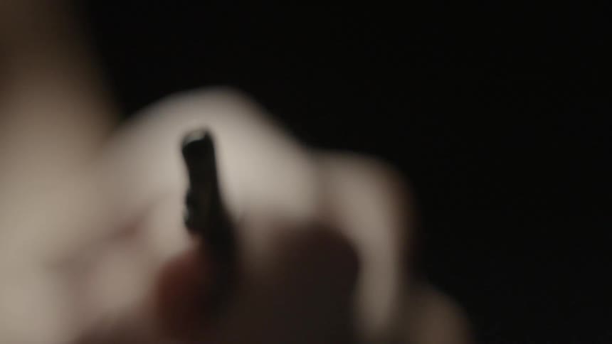 A hand holds a key