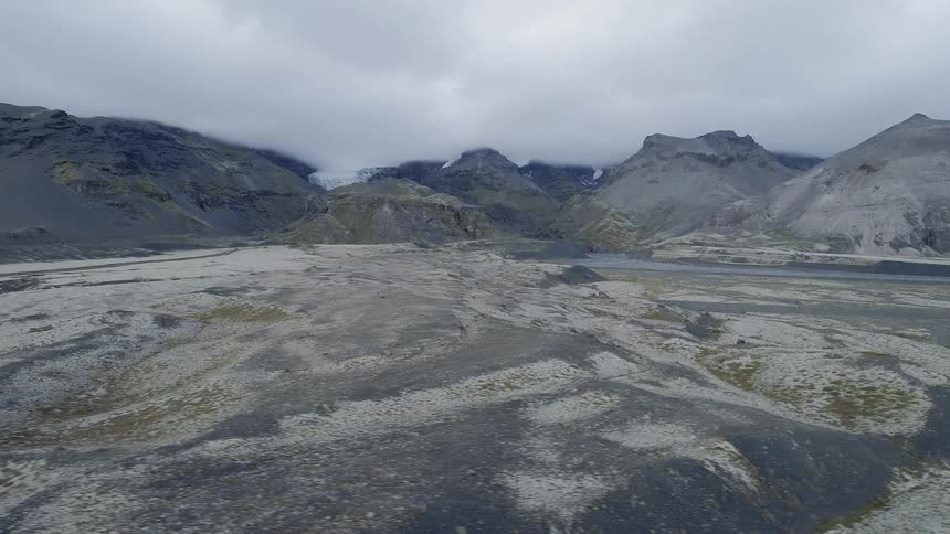 Grey clouds hang above the landscape