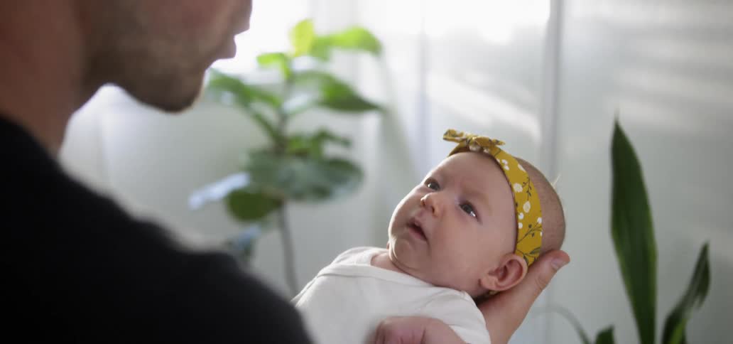 Father Holding Baby