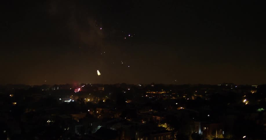 Fireworks are shot into the night sky