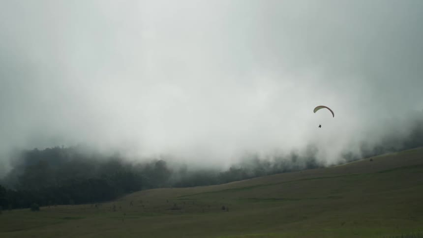 A person using a parachute