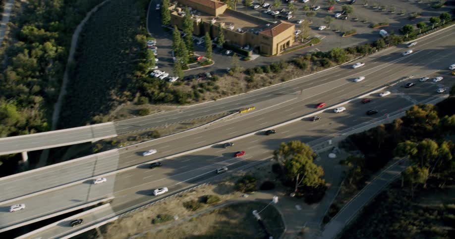 Cars drive down FreeWay in Orange County
