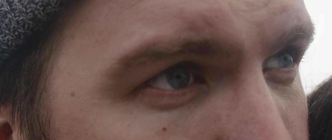 Person's eyes stare straight ahead