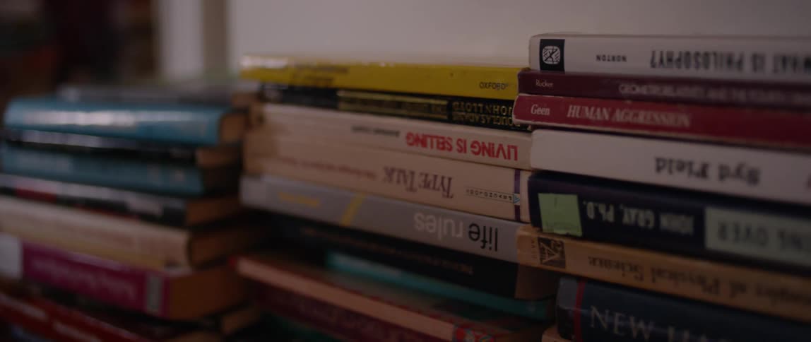 Books are stacked upside down
