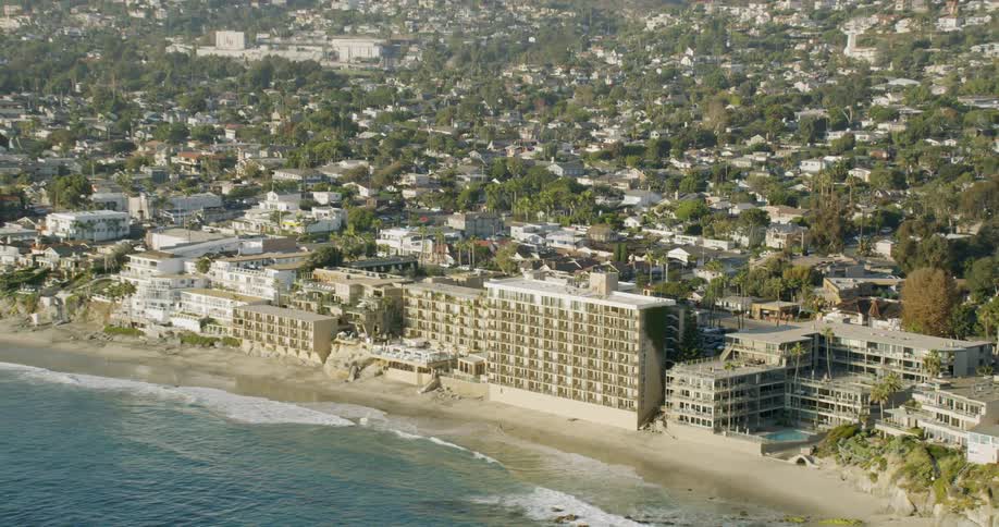 The water flows towards the beach shore