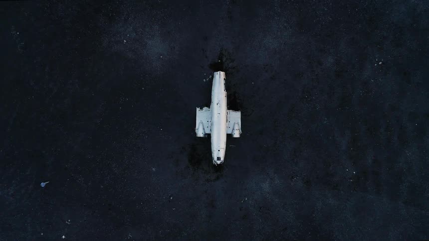 A crashed plane is on the ground