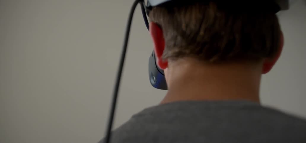 A man plays in a vr headset