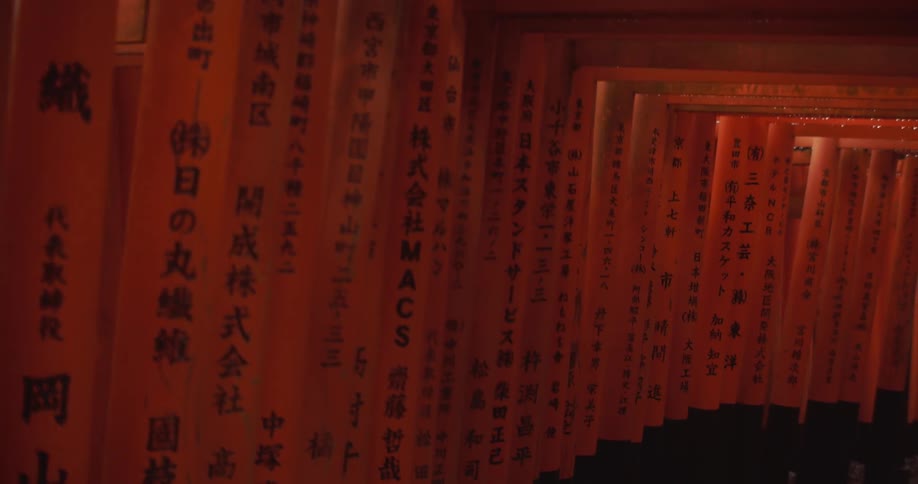 Red pillars line the walkway