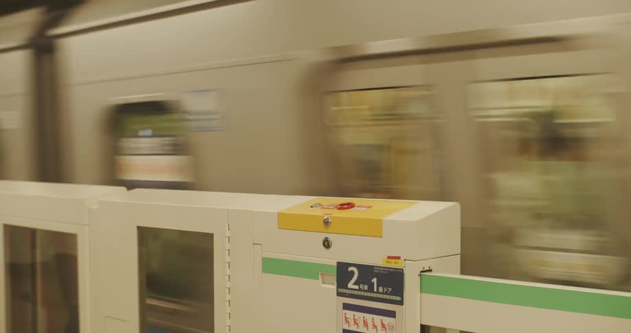 Train full of passengers travels by the barrier