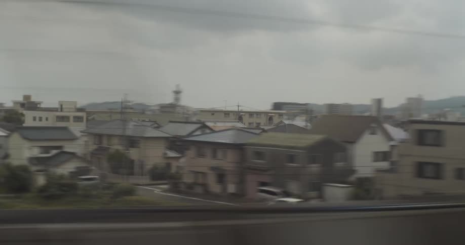 A vehicle passes by a city